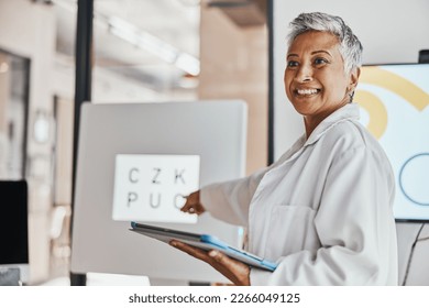 Healthcare, optometrist and woman with tablet, workshop and discussion for research, vision and smile. Medical professional, female presenter and lady with device, innovation for eyecare and wellness - Powered by Shutterstock