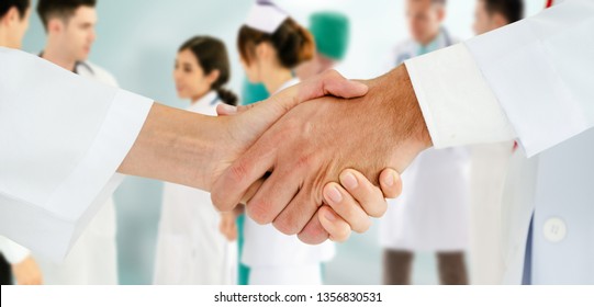Healthcare people group. Professional doctor working in hospital office or clinic with other doctors, nurse and surgeon. Medical technology research institute and doctor staff service concept. - Shutterstock ID 1356830531