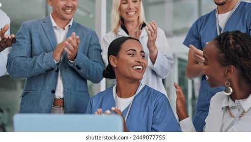 Healthcare, people and happy with celebration in hospital for promotion, victory and success on trial. Collaboration, teamwork and clapping with congratulations and staff together with achievement - Powered by Shutterstock