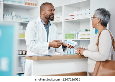 Healthcare, pharmacist and woman at counter with medicine or prescription drugs purchase at drug store. Health, wellness and medical insurance, black man and customer at pharmacy for advice and pills - Powered by Shutterstock