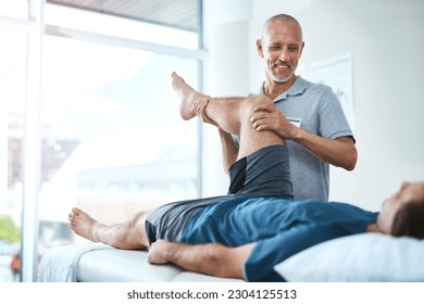 Healthcare, physiotherapist and patient with leg injury, stretching and recovery with treatment, healing or care. Male person, employee or chiropractor with a client, physical therapy or consultation - Powered by Shutterstock