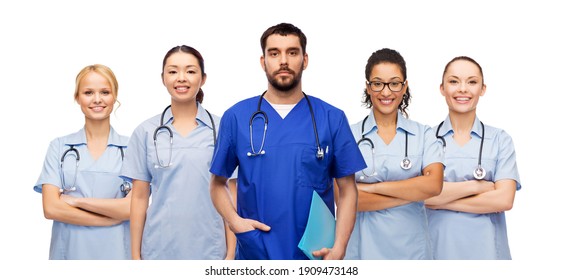 Healthcare, Profession And Medicine Concept - Doctor Or Male Nurse In Blue Uniform With Folder And Stethoscope Over International Group Of Medical Workers Over White Background