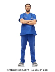 Healthcare, Profession And Medicine Concept - Doctor Or Male Nurse In Blue Uniform With Stethoscope Over White Background