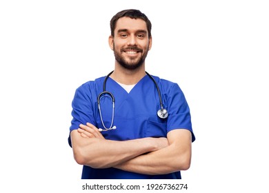 Healthcare, Profession And Medicine Concept - Happy Smiling Doctor Or Male Nurse In Blue Uniform With Stethoscope Over White Background