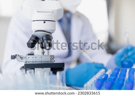 Healthcare researchers working in life science labs. Medical Science Technology Research for Vaccine Testing vaccine against coronavirus virus covid 19 cure.