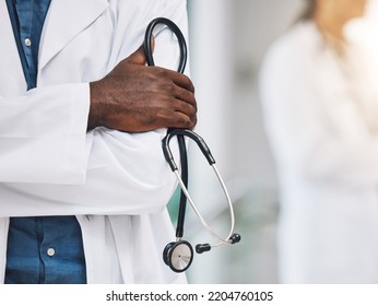 Healthcare, Stethoscope In Hand And African Doctor In Hospital. Black Man Or Medical Worker, Leader In Medicine And Innovation In Treatment. Confident, Professional And Expert Patient Care In Africa.