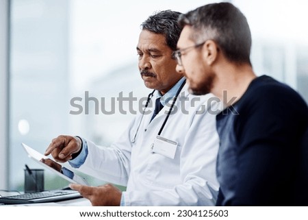 Healthcare, talking and doctor with a man and tablet for consulting, results and help with health. Planning, medicine and a mature hospital worker speaking to a patient about medical service on tech