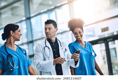 Healthcare, teamwork and doctor with nurses, medicine and talking together at hospital with trust. Medical, collaboration and smartphone with clinic, result and specialist for diagnosis and insurance - Powered by Shutterstock