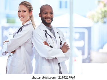 Healthcare, Teamwork And Support In The Medical Industry With Good Health Insurance And Doctors In A Hospital. Trust, Happy Smile And Partnership For Excellence In Medicine, Care And Collaboration