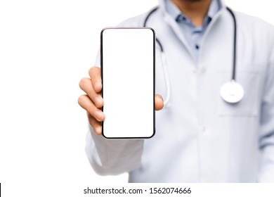 Healthcare Technologies. Unrecognizable Male Doctor Holding Modern Smartphone With Blank Screen, Closeup