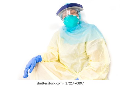 Healthcare Worker In Personal Protective Worker (PPE) Sit Down And Take A Nap Because Of Tired And Burnout. 