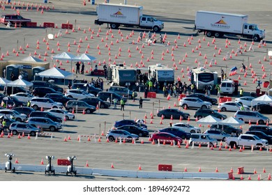 Healthcare Workers Prepare The Coronavirus (COVID-19) Vaccine For The Motorists In A Parking Lot At Dodger Stadium, Friday, Jan. 15, 2021, In Los Angeles. 