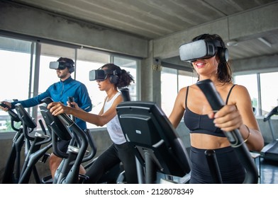 Healthy Athletic Man And Woman Wearing VR Glasses Workout Exercise On Cycling Machine In Virtual Reality Cyberspace At Fitness Gym. Metaverse Digital Entertainment Technology And Sport Concept