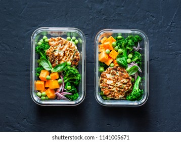Healthy balanced lunch box. Grilled chicken zucchini burgers with broccoli, pumpkin, green pea salad on a dark background, top view. Office food lunch healthy lifestyle concept    