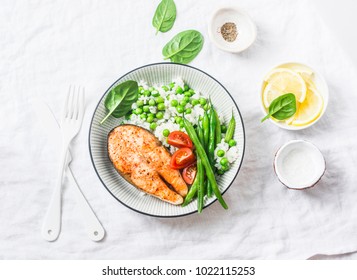 Healthy Balanced Meal Lunch Plate - Baked Salmon With Rice And Vegetables On A Light Background, Top View 