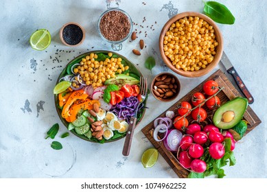 Healthy balanced vegetarian food concept, buddha bowl salad. Avocado, spinach, chick peas, vegetable appetizer plate