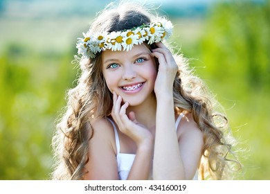 Healthy, beautiful smile, cute kid with dental braces smiling . Portrait of a little girl with orthodontic appliance.