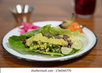 Healthy Beef Lettuce Wrap With Peppers, Onion, And Guacamole
