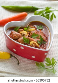 Healthy Beef Stew In Heart Shaped Bowl  With Parsley And Chili