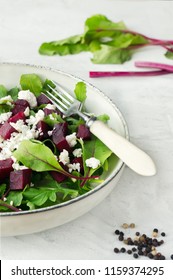 Healthy Beet Salad With Goat Cheese And Arugula. Closeup Food Vertical Photo. 