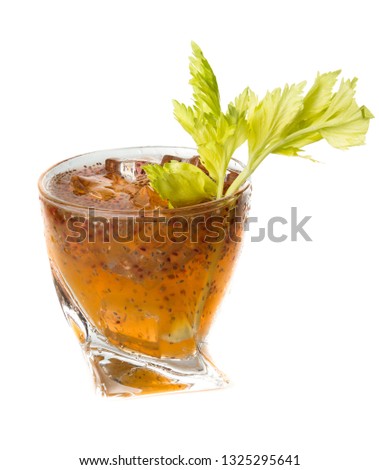 healthy beverage using hydrated chia seeds as an ingredient for a cocktail isolated on a white background with fresh celery as a garnish
