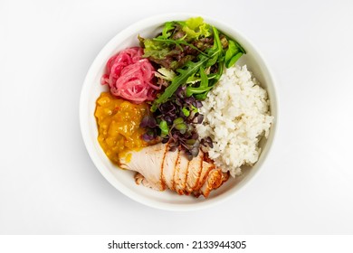 Healthy Bowl With Rice Chicken Salad And Sauce In One Top View With Copyspace. Delicious Meal Tailed Style On White Background For Recipe Book Or Restaurant Menu