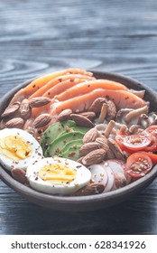 Healthy Bowl With Salmon, Avocado, Egg And Vegs