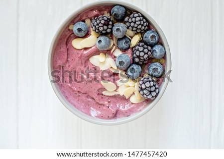 Similar – Image, Stock Photo Wild berries smoothie bowls