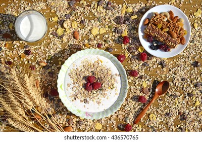 A healthy breakfast with cereal muesli, milk, nuts and berries - Powered by Shutterstock