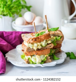 Healthy Breakfast Concept. Egg Salad Sandwich Toast Stack