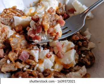 Healthy Breakfast, Egg White And Meat Lovers Scramble With Bacon Bits, Sausage Crumbles, Ham Cubes, And Cheddar Cheese