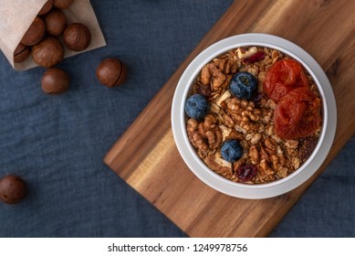 Healthy Breakfast. Granola, Walnut, Macadamia Nut And Dried Apricots.