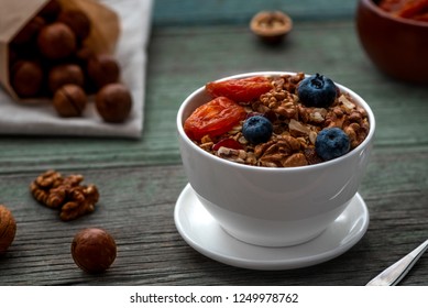 Healthy Breakfast. Granola, Walnut, Macadamia Nut And Dried Apricots.