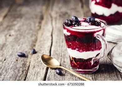 Healthy Breakfast: Honeysuckle Jam, Granola And Cottage Cheese Parfait On Rustic Wooden Background. Selective Focus 