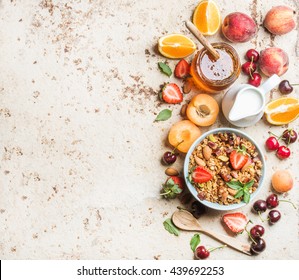 Healthy Breakfast Ingredients. Bowl Of Oat Granola With Milk, Fresh Fruit, Berries And Honey. Top View, Copy Space