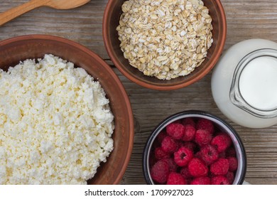 Healthy Breakfast Items. Oatmeal, Milk, Fresh Berries And Cottage Cheese. Overhead View, Rustic Style