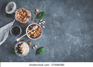 Healthy Breakfast With Muesli, Blueberry, Nuts On Grunge Background. Flat Lay, Top View