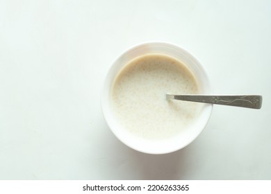 Healthy Breakfast With Oats Flakes And Banana On Table , Top Down 