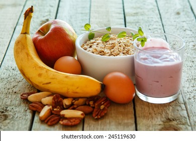 Healthy breakfast on the kitchen table - Shutterstock ID 245119630