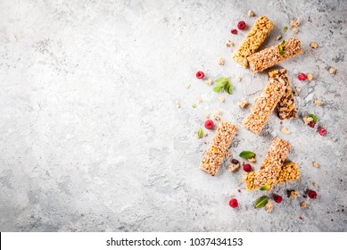 Healthy breakfast and snack concept, homemade granola bars with fresh raspberries, on grey stone stone background copy space  top view - Powered by Shutterstock