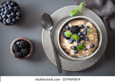healthy breakfast steel cut oatmeal porridge with blueberry blackberry - Shutterstock ID 1079695874