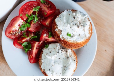 Healthy Breakfast tomato salad, muffins with cream cheese and herbs - Powered by Shutterstock