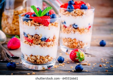 Healthy Breakfast: Yogurt Parfait With Granola,  Strawberries And Blueberries