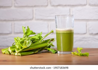 Healthy Celery Diet For The Treatment Of Incurable Mysterious Diseases. Fresh Celery Juice Squeezed Out On A Juicer.drink, Vegetable Juice, Studio Shot