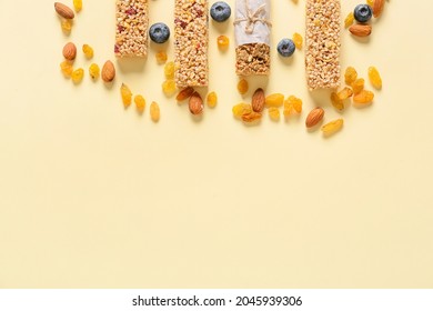 Healthy Cereal Bars, Berries And Nuts On Color Background