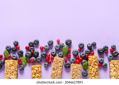 Healthy Cereal Bars And Berries On Color Background