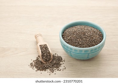 Healthy chia seed on wooden table, copy space
 - Shutterstock ID 2310770201