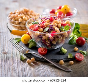 Healthy chickpea and veggies salad, diet, vegetarian, vegan food, vitamin snack - Shutterstock ID 639524224
