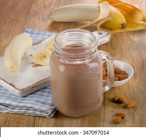 Healthy Chocolate banana smoothie in a jar. Selective focus