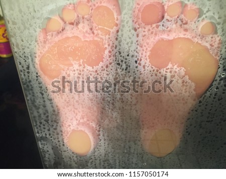 Healthy clean feet in the shower